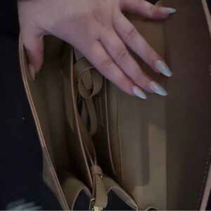 Shoulder or crossbody bag with gold hardware